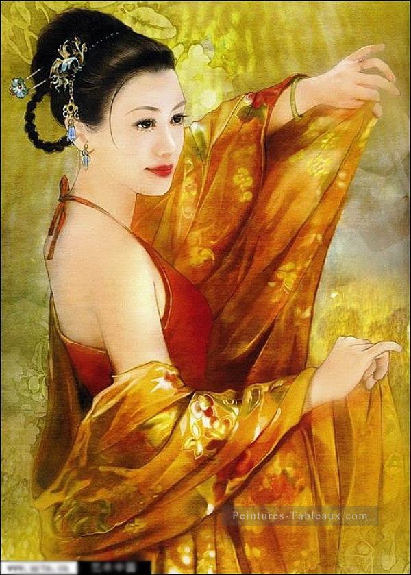 Jeune fille chinoise en jaune Peintures à l'huile